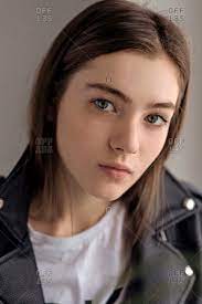 Unlike bright hair colors, there's no defining making them unique to a degree. Portrait Of Young Woman With Brown Hair Stock Photo Offset