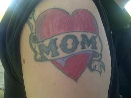 There are a wide range of mother daughter tattoo options you should consider, the half butterfly wing for instance is a great idea because the mum can spot the right wing while the daughter can spot the left wing. Simple Love Mom Tattoo On Shoulder