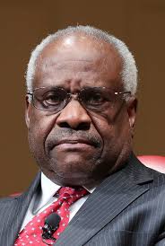 Justice Thomas talks at court arguments, 1st time in 3 years