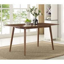 In your small dining room 60 Inch Mid Century Dining Table By Walker Edison