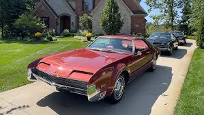 Image result for Riviera Red 1966 GM