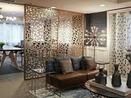 Screens and room dividers are an excellent and decorative way to partition a large space into smaller areas on a temporary basis. Decorative Screen Room Divider Double Layer Bronze Gold Aluminum Composite Panels Floor To Cei Room Partition Designs Modern Room Divider Room Partition Wall