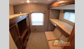 Travel trailers are compact for moving but spacious for living, and easier to maintain. Bunkhouse Travel Trailer Rvs Affordable Family Friendly Camping Wilkins Rv Blog