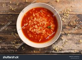 · add broth, vegetables, potato, bay leaf, tomato paste, and . Alphabet Soup Images Stock Photos Vectors Shutterstock