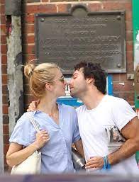 Her height is 1.73 m and weight is 57 kg. Aidan Turner Kisses Girlfriend Caitlin Fitzgerald Before They Grab Fish And Chips In London