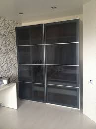 Open wardrobe with sliding door. Ikea Pax Wardrobe Sliding Doors Wardobe Pedia