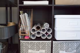 One side of the table has storage underneath, while the other side has room for a pair of stools. Turn Any Closet Into A Craft Closet With These Organization Ideas