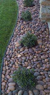 Use metal borders to keep gravel and stone in place. 40 Stylish And Inspiring Garden Edging Ideas Digsdigs