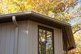 Old galvanized gutters with seams have been replaced by seamless aluminum or copper gutters in a variety of brown, beige, gray, dark blue, red and green colors. Should Gutters Match Trim Or House Beldon