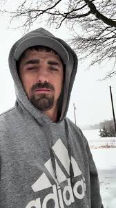 Sitting in Snow in Shorts