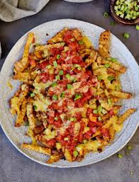 Add another layer of tortilla chips, lentils, and cheese. Loaded Nacho Fries Recipe Easy Vegan Elavegan Recipes
