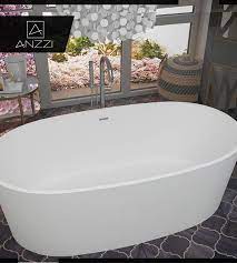 ··· hot sale man made bathroom white marble natural stone bath tub if the bathtub package is lost during the shipment. Anzzi Roccia 5 1 Ft Man Made Stone Center Drain Freestanding Bathtub In Matte White Ft Az505 The Home Depot Free Standing Bath Tub Bathtub Remodel Bathtub