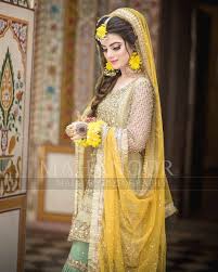 Image May Contain 1 Person Standing Bridal Mehndi Dresses Pakistani Bridal Hairstyles Pakistani Bride