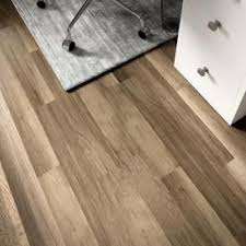 At floor city, we supply handsculpted, stone & wood or reclaimed residential laminate wood flooring. Style Selections Aged Gray Oak 7 59 In W X 50 7 In L Smooth Wood Plank Laminate Flooring 21 44 Sq Ft Lowes Com Wood Laminate Flooring Oak Laminate Flooring Wood Planks
