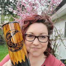 Hand-painted Haida-inspired glass art pieces