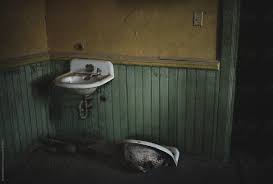 old sink in an abandoned school by