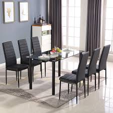 Check out our kitchen table and chairs selection for the very best in unique or custom, handmade pieces from our dining room furniture shops. Fitnessclub 136cm Dining Room Table 6 Chairs Set Home Kitchen Living Room Furniture Rectangular Black Clear Glass Tabletop Metal Frame Dining Table High Back Faux Leather Padded Chairs Design Black Buy Online In