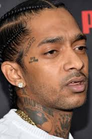 Rapper nipsey hussle recently got a tattoo with the letter s on his face. Meanings Behind Nipsey Hussle S Tattoos New Images Also Celebrities With Nipsey Hussle Tattoos Tattoo Me Now