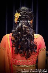 Lehenga hairstyles for wedding reception. Indian Bride S Reception Hairstyle By Vejetha For Swank Studio Curls Bridal Lehenga Hair Accessories Hair Styles Womens Hairstyles Indian Bridal Hairstyles