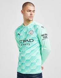 The kit is completed with black shorts and dark blue socks. Green Puma Manchester City Fc 2020 21 Away Goalkeeper Shirt Jd Sports