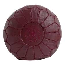 Style a leather tufted ottoman coffee table with various objects, including trays, books, magazines, flowers, candles, or decorative sculptures. Modern Burgundy Leather Pouf Ottoman Chairish