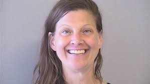 Woman arrested after police say she was running and dancing around a  complex naked