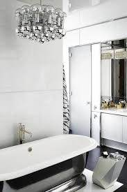 One bathroom has brass faucets, the other has black ones that play off the black mirror. 40 Black White Bathroom Design And Tile Ideas