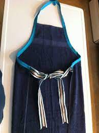 These are the steps for creating a simple, yet useful bath towel apron at home. Diy Towel Apron Need This Keeps You Dry During Baby S Bath Time Towel Apron Diy Towels Baby Sewing