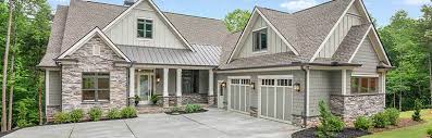 Stone siding and a metal roof combine to give this contemporary home plan its curb appeal.the amazing floor plan is wide open so that the. Courtyard Garage House Plans Don Gardner House Plans