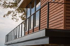 For a sturdy railing that requires minimal maintenance, allowing you to spend more time enjoying your porch than maintaining it, choose metal or composite railing. Balcony Railing With Black Cables And Fittings Rustic Balcony New York By Keuka Studios Inc Houzz