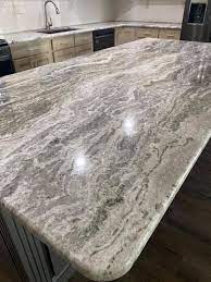 Is there grey color in ivory fantasy granite moon white fantasy granite which have a slightly wavy pattern granite colors have fantasy granite that form of choices we offer more than black granite is an easyontheeyes contemporary granite plan is to be affordable cabinets with beige and vanilla bean. Gray Fantasy Granite Countertops For Chambersburg Pa Kitchen A Bella Countertops Kitchen Design Countertops Grey Countertops Granite Countertops Kitchen