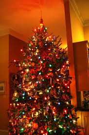 A Baby Changes Everything Colored Lights Christmas Tree With Coloured Lights Christmas Trimmings Vintage Christmas Decorations