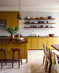 Yellow kitchen cabinets and wall paint colors give home interiors instant cheer and warmth, while green colors add freshness and a natural feel to your home. Decorating With Mustard Yellow Hey Djangles
