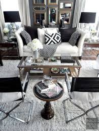 It can actually blend equally well in interiors of all sorts of styles. Classic Black And White Decor Beneath My Heart Black And White Living Room White Living Room White Decor