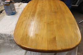 If you want to avoid plywood, you can use several different planks of solid wood and join them together creatively to make a really attractive looking table top for your kitchen. How To Refurbish Or Repaint A Table Top