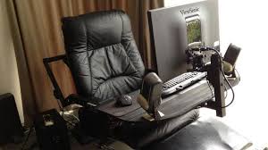 A Computer In A Leather Recliner A Compact And Comfortable Workspace Comfortable Workspace Gaming Computer Desk Computer Desk