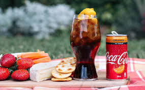 Risultati immagini per Coca-Cola Orange