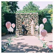 Enter the photo booth and proceed to take adorable and funny couple photos. Outdoor Proposal Outdoor Proposal Proposal Decorations Marry Me Balloons