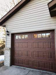 Amarr Designer S Choice Garage Door In Walnut With Thames Windows Garage Doors Lake Houses Exterior Carriage House Doors