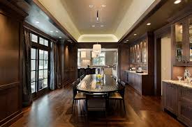The dark tabletop begs for a white or lace table runner for formal dining or when entertaining. Large Formal Dining Room With Built In Cabinetry Transitional Dining Room Chicago By Abruzzo Kitchen Bath Houzz