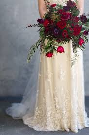 After a few years expericence as a florist with fresh flowers, i realized that the artificial flowers have a great deal of potential in the industry, especially in australia. Elegant Ivory And Crimson Winter Bridal Bouquet Natalie Mcnally Weddings At Repinned Net