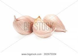 A clove of garlic is one segment of a head of garlic. Three Cloves Garlic Image Photo Free Trial Bigstock