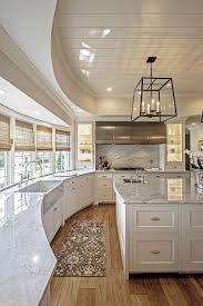 White And Grey With A Hint Of Light Brown It Looks Very Lovely I Also Like The Rounded Kitchen Area Home Kitchens Home Decor Kitchen Kitchen Design
