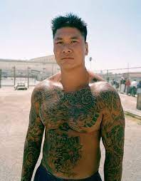A gangster is a criminal who is a member of a gang. 100 Notorious Gang Tattoos Meanings Ultimate Guide 2021
