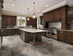 Awesome Design Of The Kitchen Tile Floor With Grey Color Added With Brown Wooden Kitchen Cabinets Kitchen Tiles Design Kitchen Floor Tile Luxury Kitchen Design