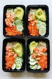 Stir together olive oil, garlic, herbs, and juice of 1/2 lemon. Cauliflower Rice Salmon Poke Bowl Meal Prep Meal Prep Bowls Salmon Meal Prep Macro Friendly Recipes