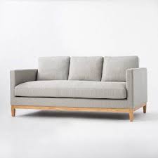 woodland hills wood base sofa light gray threshold designed with studio mcgee in 2021 wooden frame sofa studio mcgee sofa