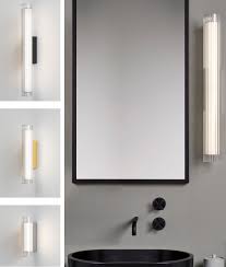 Choose metallic finishes like satin nickel, chrome and brushed steel combined with frosted glass and brilliant crystal and more. Modern Led Bathroom Wall Light With Reeded Clear Glass And Bright Metalwork Construction
