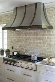 Marble, travertine or glass brick layout kitchen backsplash tiles. White And Gray Brick Cooktop Tiles Transitional Kitchen