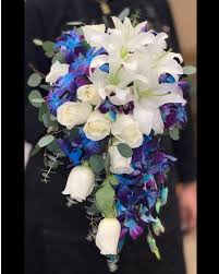 Plan a wedding beyond your expectations at one of our many venues. Cascade White And Blue Bridal Bouquet Las Vegas Wedding Flower